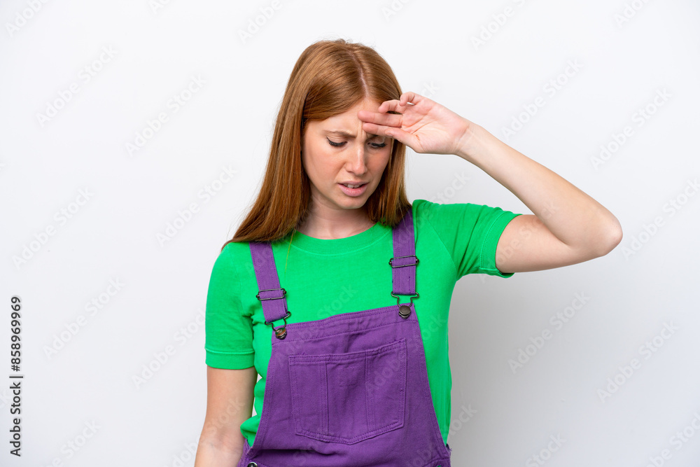 Young redhead woman isolated on white background with tired and sick expression Young redhead woman isolated on white background with tired and sick expression