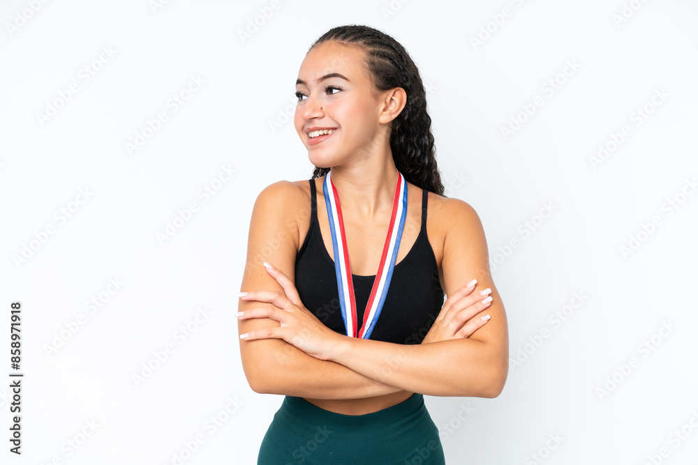 Young sport woman with medals isolated on white background happy and smiling Young sport woman with medals isolated on white background happy and smiling