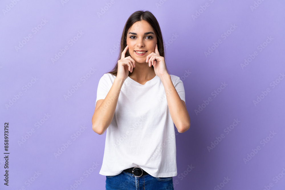 Young caucasian woman isolated on blue background smiling with a happy and pleasant expression Young caucasian woman isolated on blue background smiling with a happy and pleasant expression