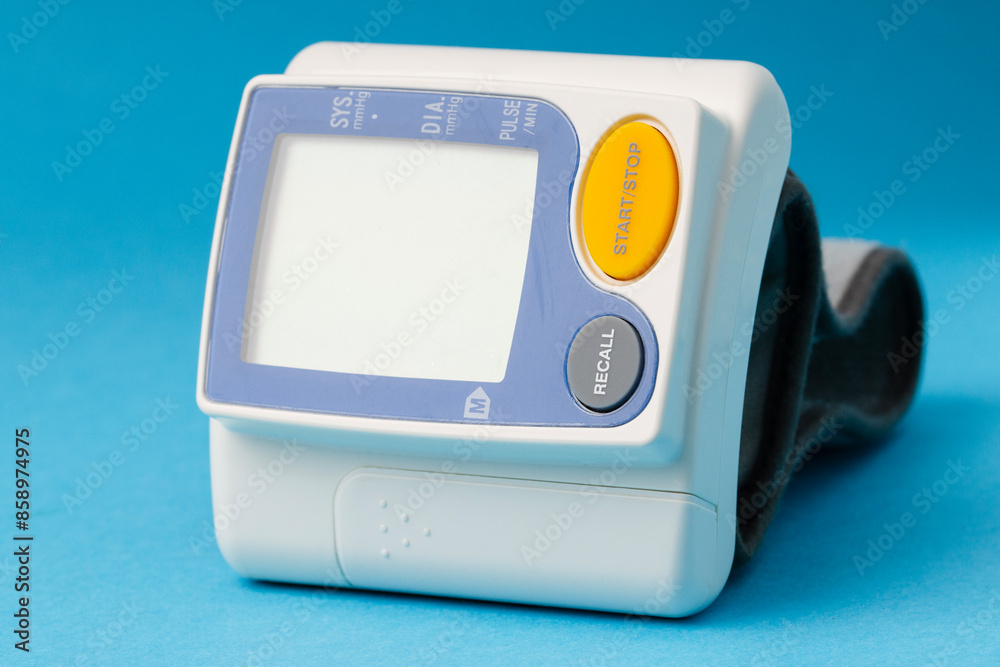 Digital blood pressure tonometer   on a blue background