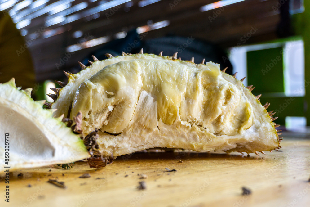 Close up fresh of durian fruit on wooden table. Close up fresh of durian fruit on wooden table.
