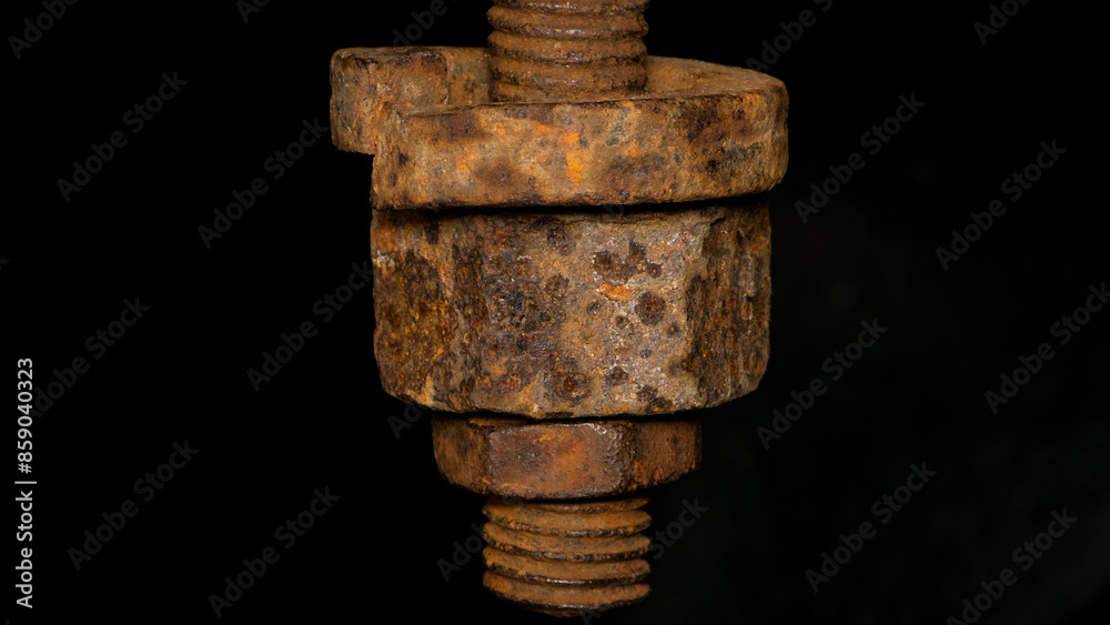 rusty nut. Rusty iron rod with screw threads. Rusted mechanical components. threaded bolt and nut isolated close up. dismantling concept, difficult to unscrew, non-removable. rusty nut. Rusty iron rod with screw threads. Rusted mechanical components. threaded bolt and nut isolated close up. dismantling concept, difficult to unscrew, non-removable.