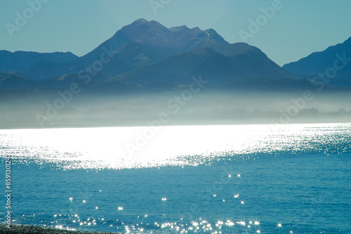 Strolling on the beach under the winter sun in New Zealand