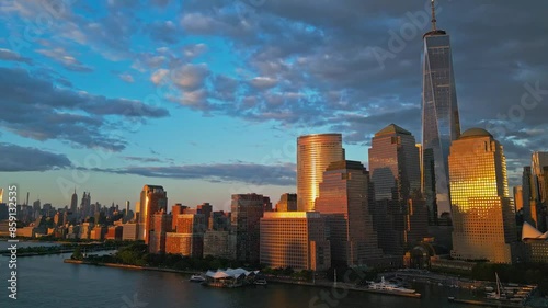 Cloud in NYC. New York City Skyline with dramatic sky. NYC near dramatic clouds at night. New York City skyline at dusk, cityscape of Manhattan in New York. Aerial view on Manhattan. Evening in NYC.