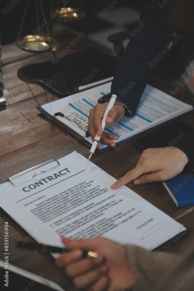 Judge gavel with Justice lawyers having team meeting at law firm background. Concepts of Law and Legal services. Judge gavel with Justice lawyers having team meeting at law firm background. Concepts of Law and Legal services.
