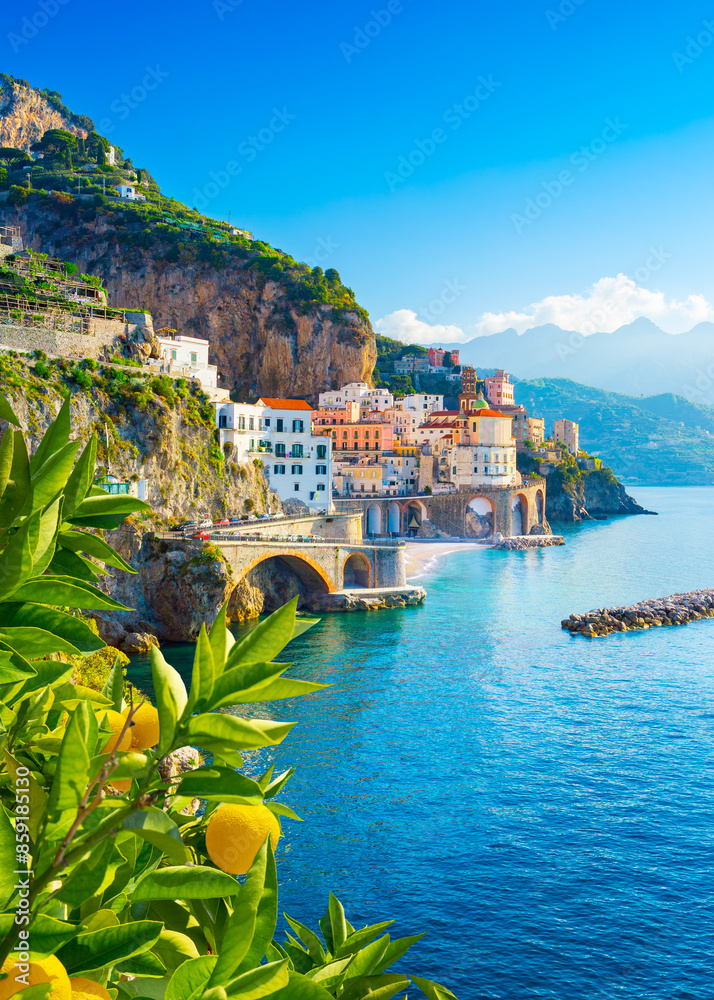 Beautiful view of Amalfi on the Mediterranean coast with lemons in the foreground, Italy