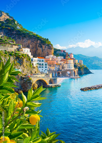 Obraz na płótnie Beautiful view of Amalfi on the Mediterranean coast with lemons in the foreground, Italy w salonie