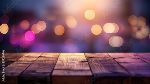 a close up of a rustic empty wooden table with blurred purple bokeh light background