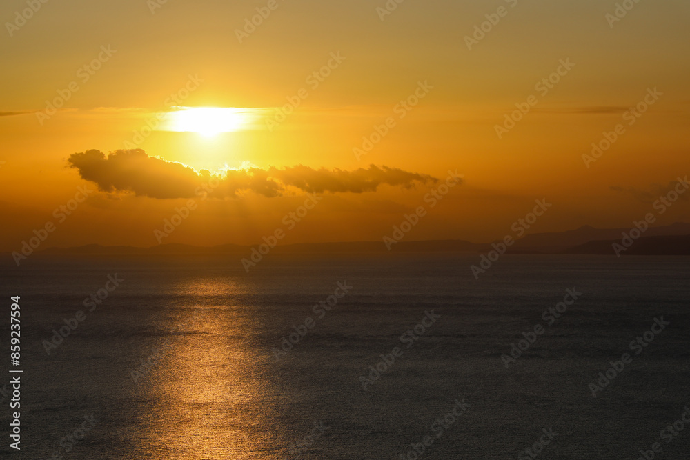 Amazing sunrise with mountains and calm sea in the background, Crete Amazing sunrise with mountains and calm sea in the background, Crete