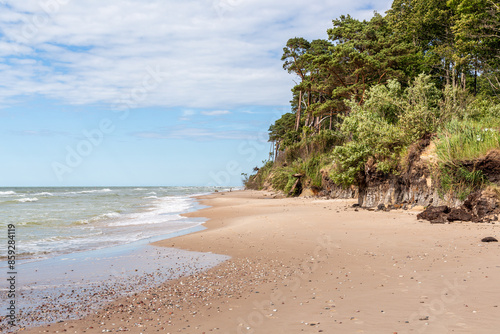 Fototapeta Naklejka Na Ścianę i Meble -  Staldzene steep coast beach at the Baltic sea in June in summer in Ventspils in Latvia