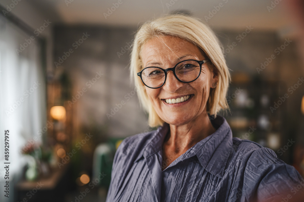 Self portrait of mature senior woman stand and take picture of herself Self portrait of mature senior woman stand and take picture of herself