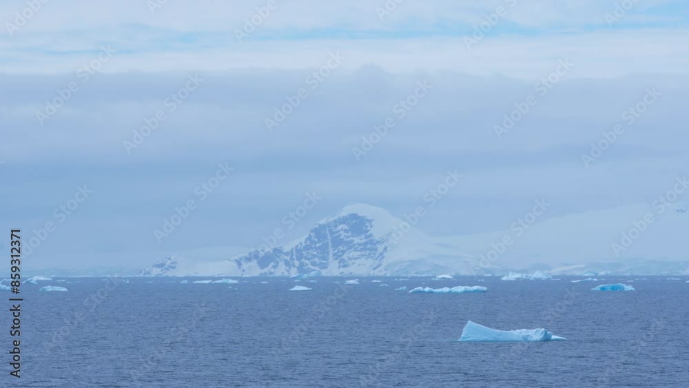 Beautiful Serene Arctic Cruising Frozen Landscape. Land of Ice and Snow Antarctica Icebergs Snow Covered Mountains Beautiful Serene Arctic Cruising Frozen Landscape. Land of Ice and Snow Antarctica Icebergs Snow Covered Mountains