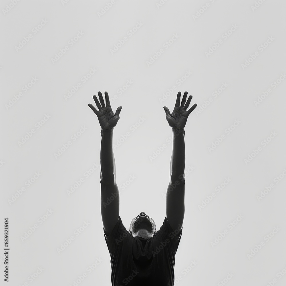 Person standing with arms raised upward, palms together. Person standing with arms raised upward, palms together.