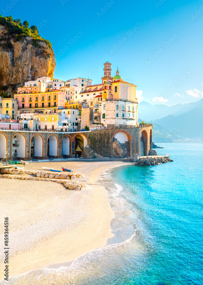 Morning view of Amalfi cityscape on coast line of mediterranean sea, Italy