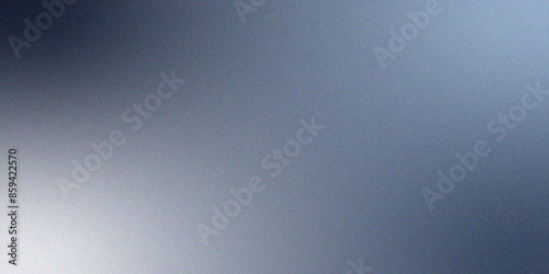 Ombre Blue noise with grainy gradient. Pastel luxury blue gradient foil shimmer background. Grainy glowing blue light on dark backdrop noise. Textured with rough grain, noise, and bright spots.