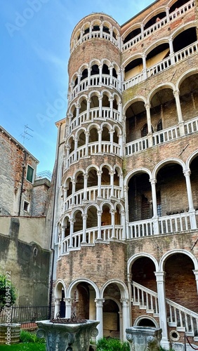 The Palazzo Contarini del Bovolo with its external multi-arch spiral staircase in Venice, Italy photo