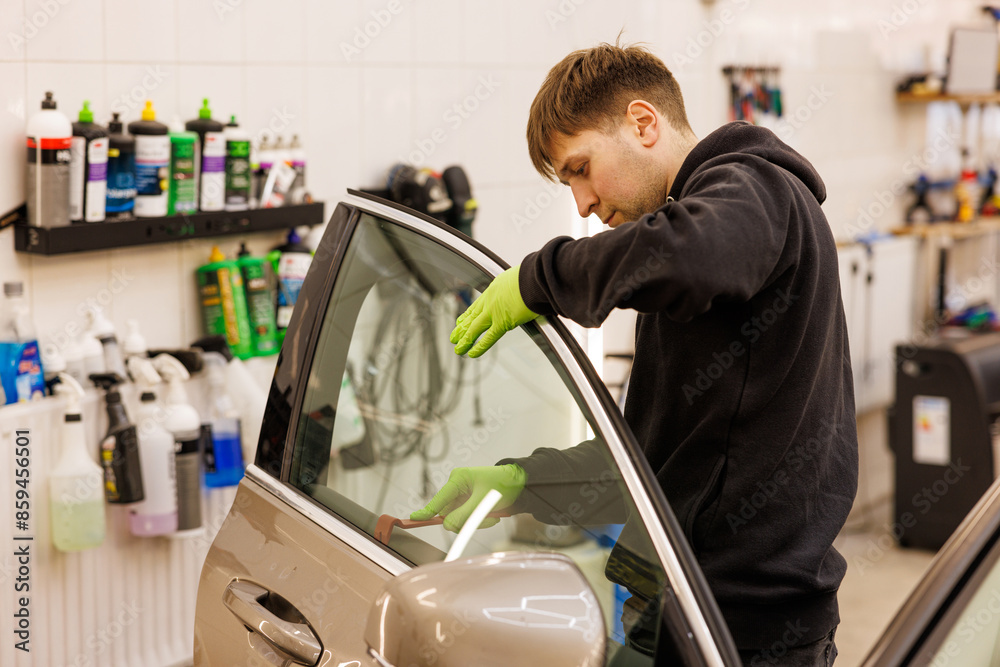 Man repair right door car locks mechanic