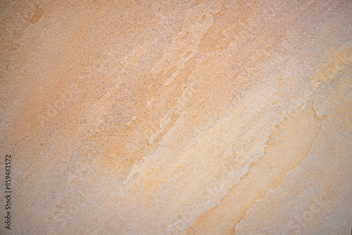 texture of the stone in beige color. Nature background 