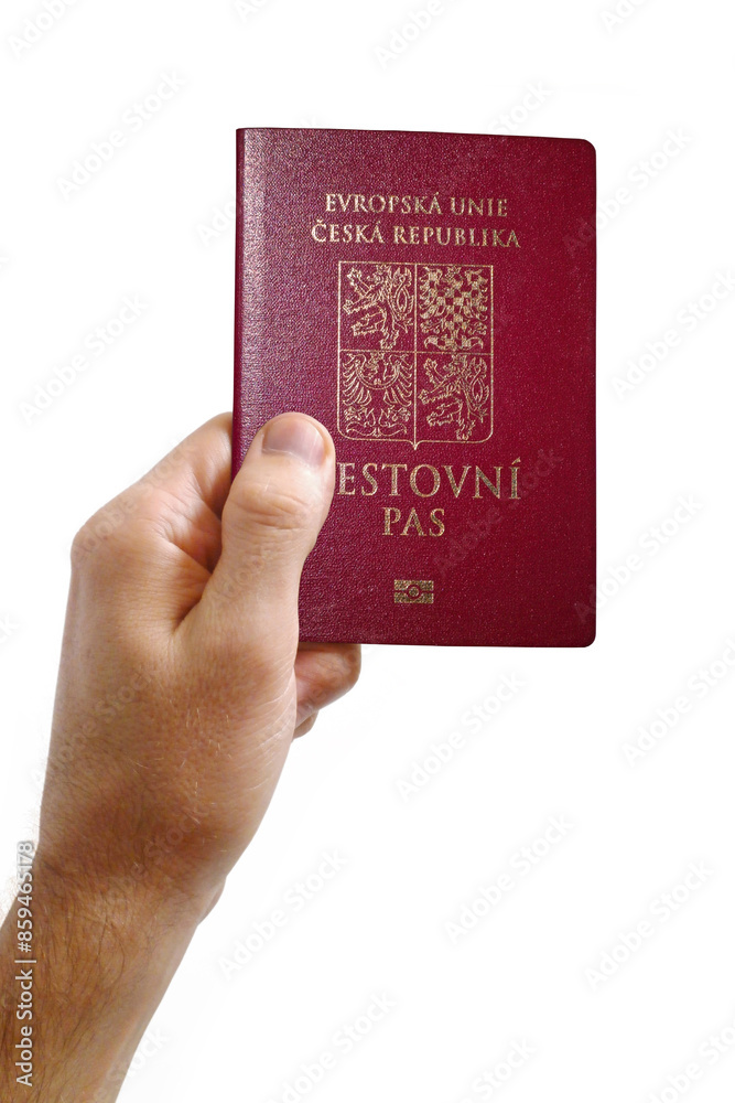 Man holding an Czech passport against a white background Man holding an Czech passport against a white background