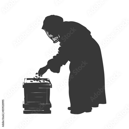 Silhouette of old woman donating coins to a wooden charity box.