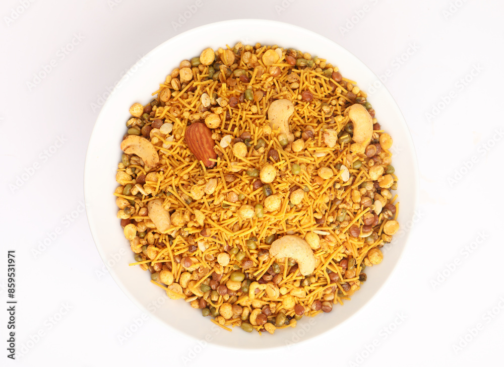 Traditional Indian deep fried salty dish called chivda or mixture or farsan made of gram flour and mixed with dry fruits Traditional Indian deep fried salty dish called chivda or mixture or farsan made of gram flour and mixed with dry fruits