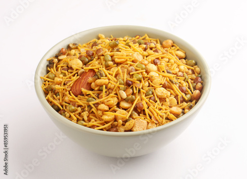 Traditional Indian deep fried salty dish called chivda or mixture or farsan made of gram flour and mixed with dry fruits