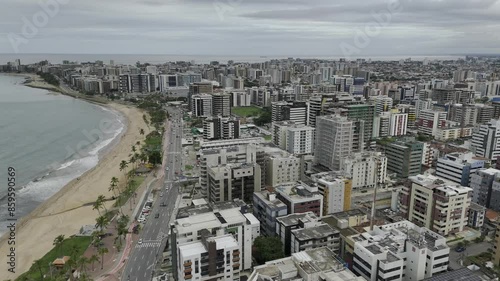 Drone flies south from Praia de Jatiuca over high rise buildings in Maceio, Alagoas, Brazil photo