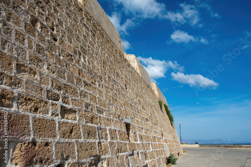 Stone wall fortress at Chania Crete island Greece. Under view of stonewall, Acropolis of Kydonia photo