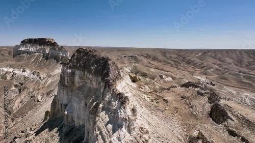 Each mountain of Airakty appears as a formidable fortress, their edges resembling towers, earning them the moniker “Valley of Castles”. Mangystau Province, western Kazakhstan. photo