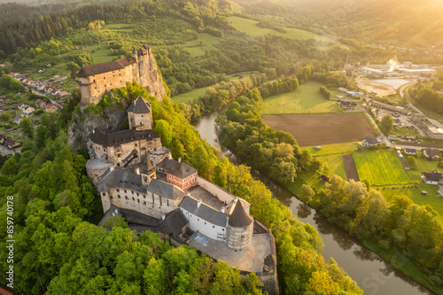 Medieval Oravsky Hrad castle at sunrise in Slovakia. Aerial view photo