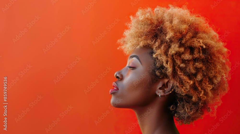 Cropped photo of young attractive Afro girl in blonde wig. Cropped photo of young attractive Afro girl in blonde wig.