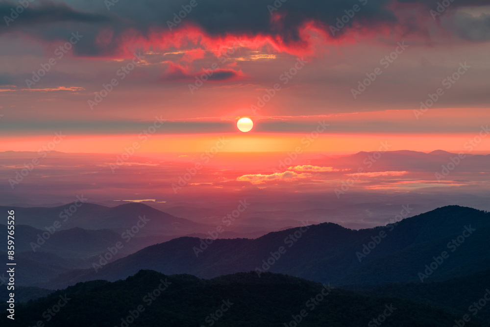Dramatic sunrise over layered ridges in the Blue Ridge Mountains of North Carolina Dramatic sunrise over layered ridges in the Blue Ridge Mountains of North Carolina
