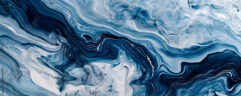 Marble abstract background showcasing a blend of rich blue and white tones. The patterns are fluid and dynamic, reminiscent of ocean waves Marble abstract background showcasing a blend of rich blue and white tones. The patterns are fluid and dynamic, reminiscent of ocean waves