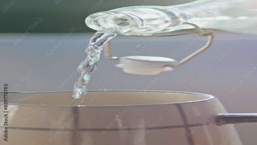 Girl hands pouring aqua at jug at fresh air vertical closeup. Woman drink water Girl hands pouring aqua at jug at fresh air vertical closeup. Woman drink water