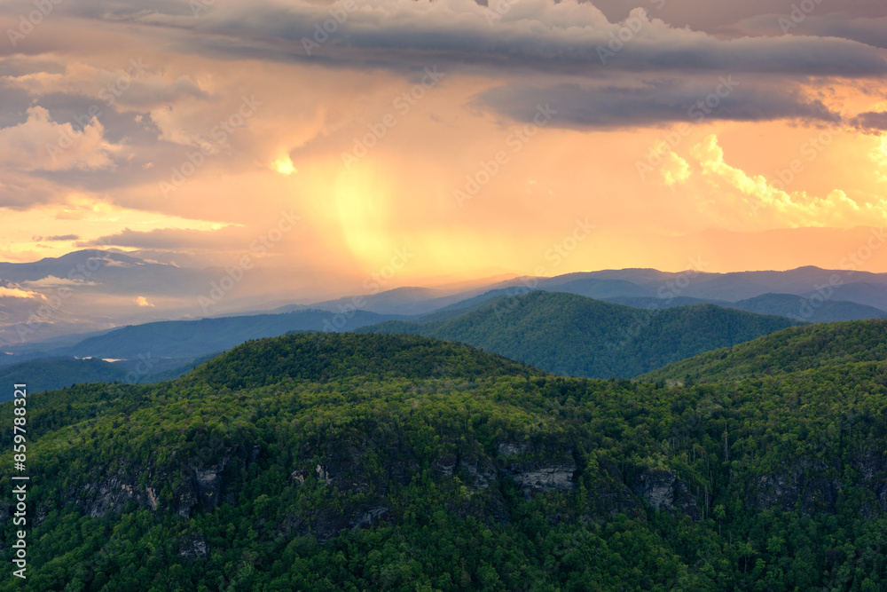 Scenic summer sunrise,passing storm at sunset, linville gorge, north carolina Scenic summer sunrise,passing storm at sunset, linville gorge, north carolina