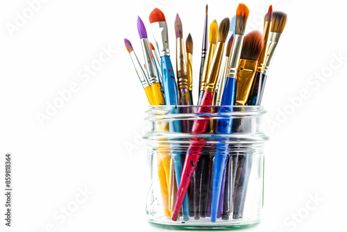 a jar filled with lots of different colored paint brushes