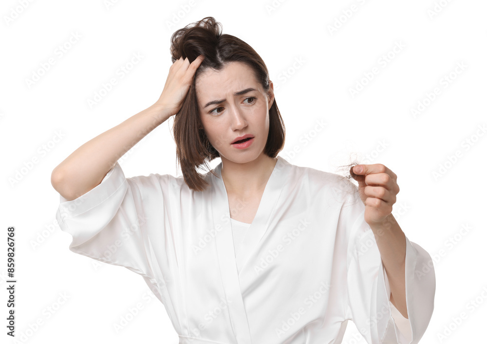 Stressed woman holding clump of lost hair on white background. Alopecia problem Stressed woman holding clump of lost hair on white background. Alopecia problem