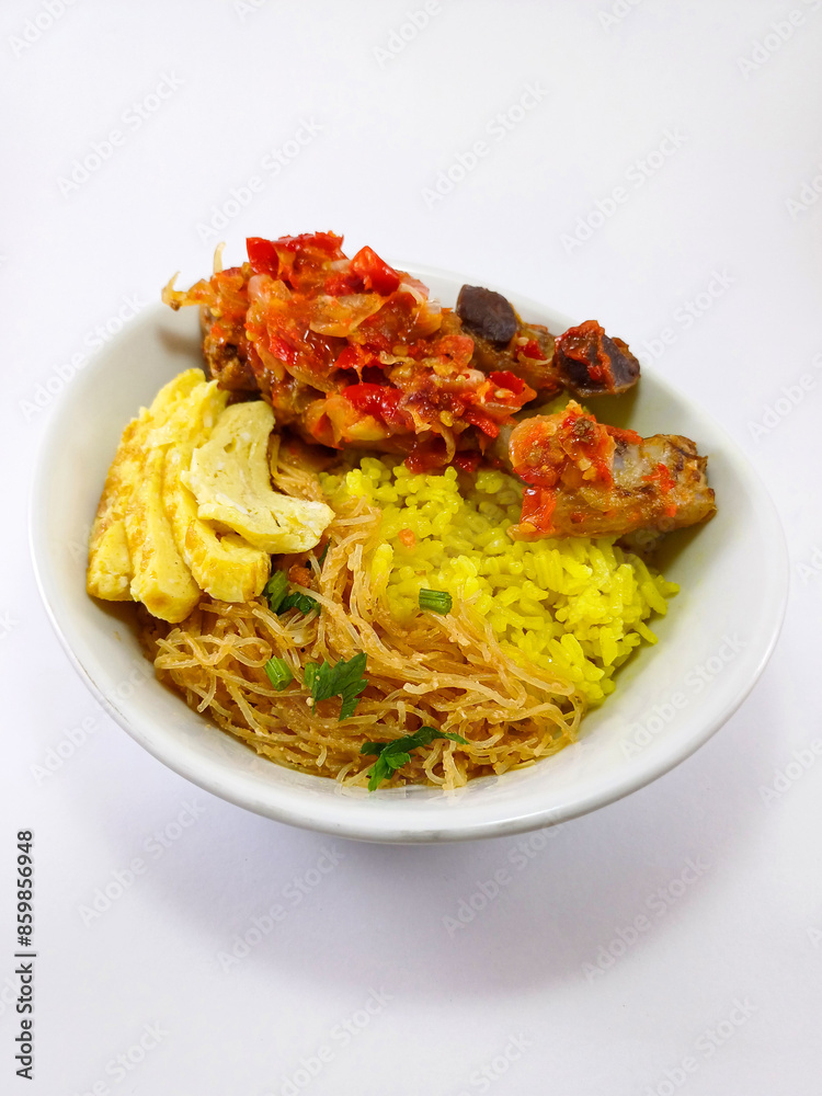 Indonesian Feast in a Cup: Nasi Kuning with Chicken, Egg, and Fragrant Rice on a White Background Indonesian Feast in a Cup: Nasi Kuning with Chicken, Egg, and Fragrant Rice on a White Background