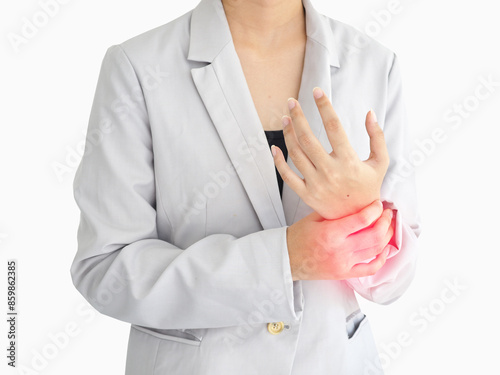 Young woman suffering from wrist pain, numbness, or carpal tunnel syndrome. Health concept.