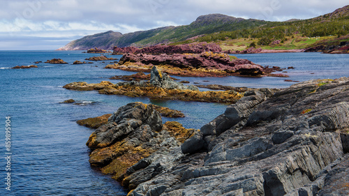 The natural colors at Tickle Cove are ridiculously vibrant. Tickle Cove Sea Arch is one of ten sites of the Discovery UNESCO Geopark on Bonavista Peninsula, Newfoundland. photo