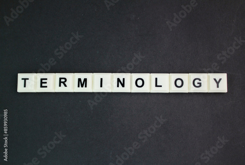 letters of the alphabet with terminology words. the body of terms used with a particular technical application in a subject of study photo