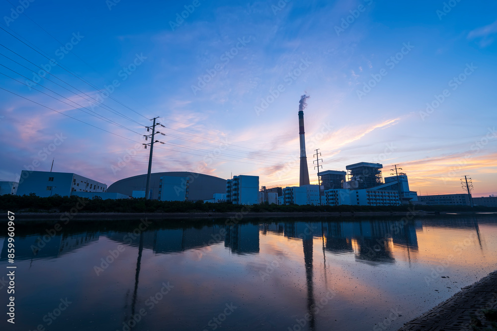 the riverside factory and the beautiful sunset glow the riverside factory and the beautiful sunset glow