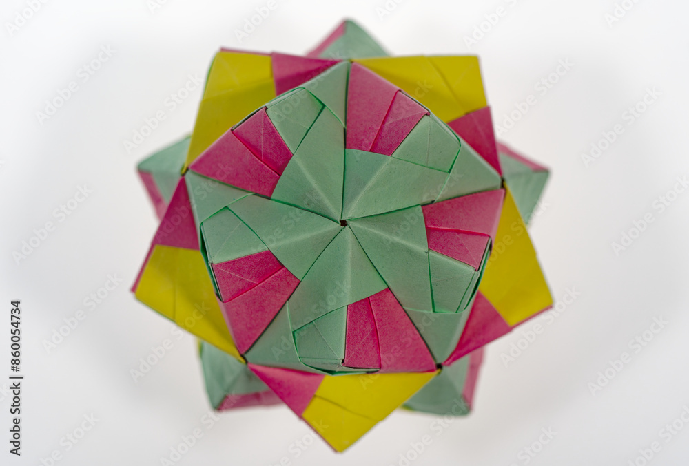 Top view of abstract colorful cube lying on white background. Photo taken June 22nd, 2024, Zurich, Switzerland. Top view of abstract colorful cube lying on white background. Photo taken June 22nd, 2024, Zurich, Switzerland.