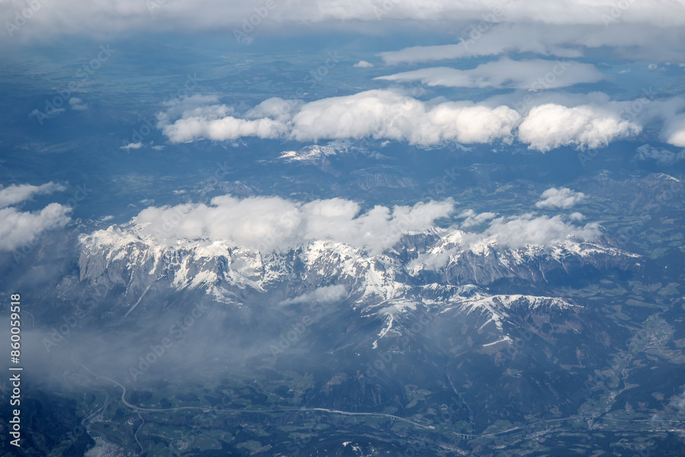 Fototapeta premium Cloud Formations and the alps near the Zugspitze from an Air Plane