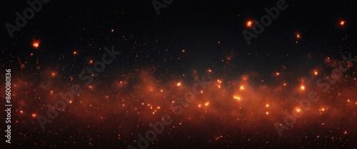 Fire embers particles over Black background. Fire sparks background. Abstract dark glitter fire particles lights