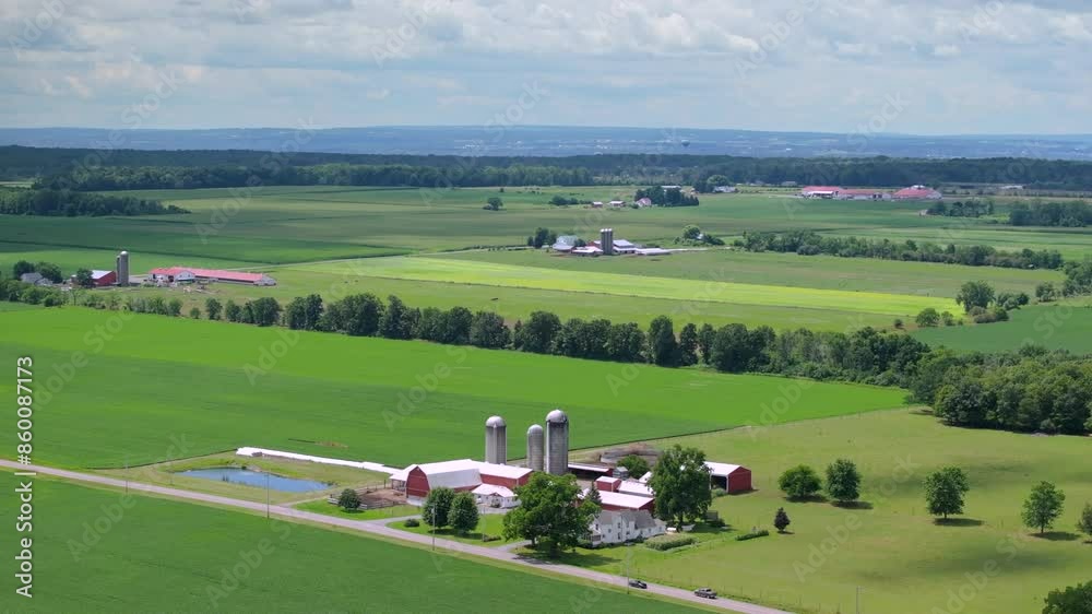 Farm barn and silos in rural Ohio, USA. American agricultural landscape
