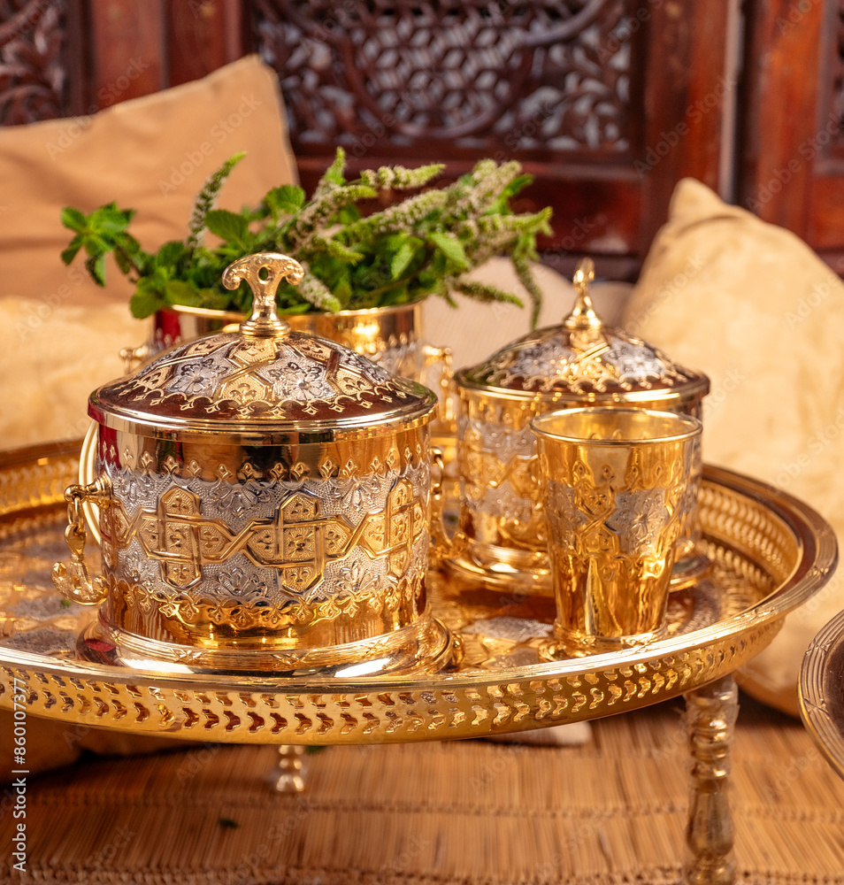 Ornate Golden Moroccan Teapots and Glasses With Dates on a Tray Ornate Golden Moroccan Teapots and Glasses With Dates on a Tray
