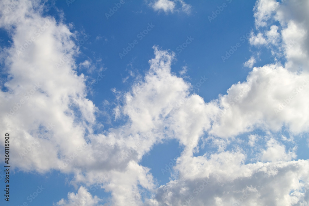 Blue sky, clouds and wallpaper in nature with background for location, banner and natural environment in summer. Climate, skyline or morning scenery with landscape, cloudscape and heaven in Barcelona Blue sky, clouds and wallpaper in nature with background for location, banner and natural environment in summer. Climate, skyline or morning scenery with landscape, cloudscape and heaven in Barcelona