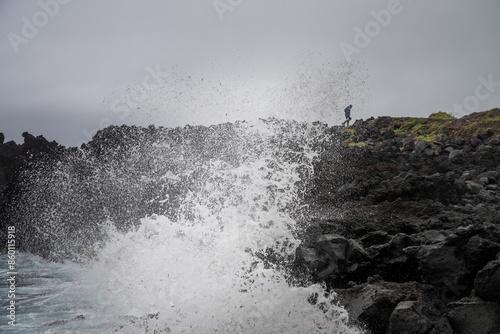 waves crashing on rocks
