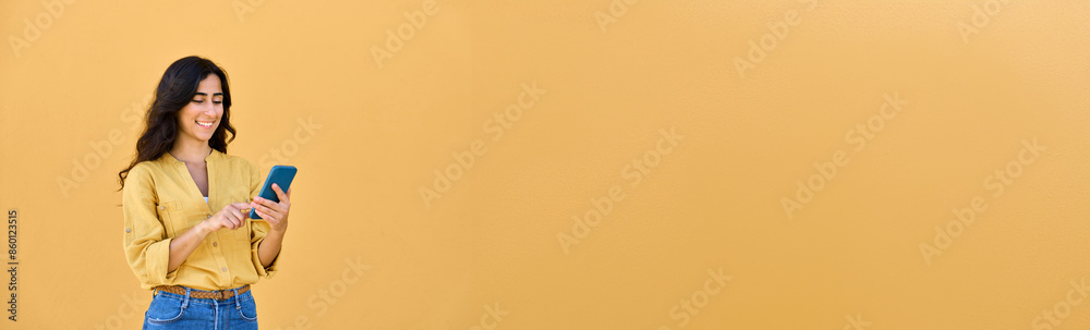 Banner with copy space of girl student, young business entrepreneur using smartphone cellphone for communication. Isolated portrait of middle eastern Indian, Arabian woman holding mobile phone device Banner with copy space of girl student, young business entrepreneur using smartphone cellphone for communication. Isolated portrait of middle eastern Indian, Arabian woman holding mobile phone device